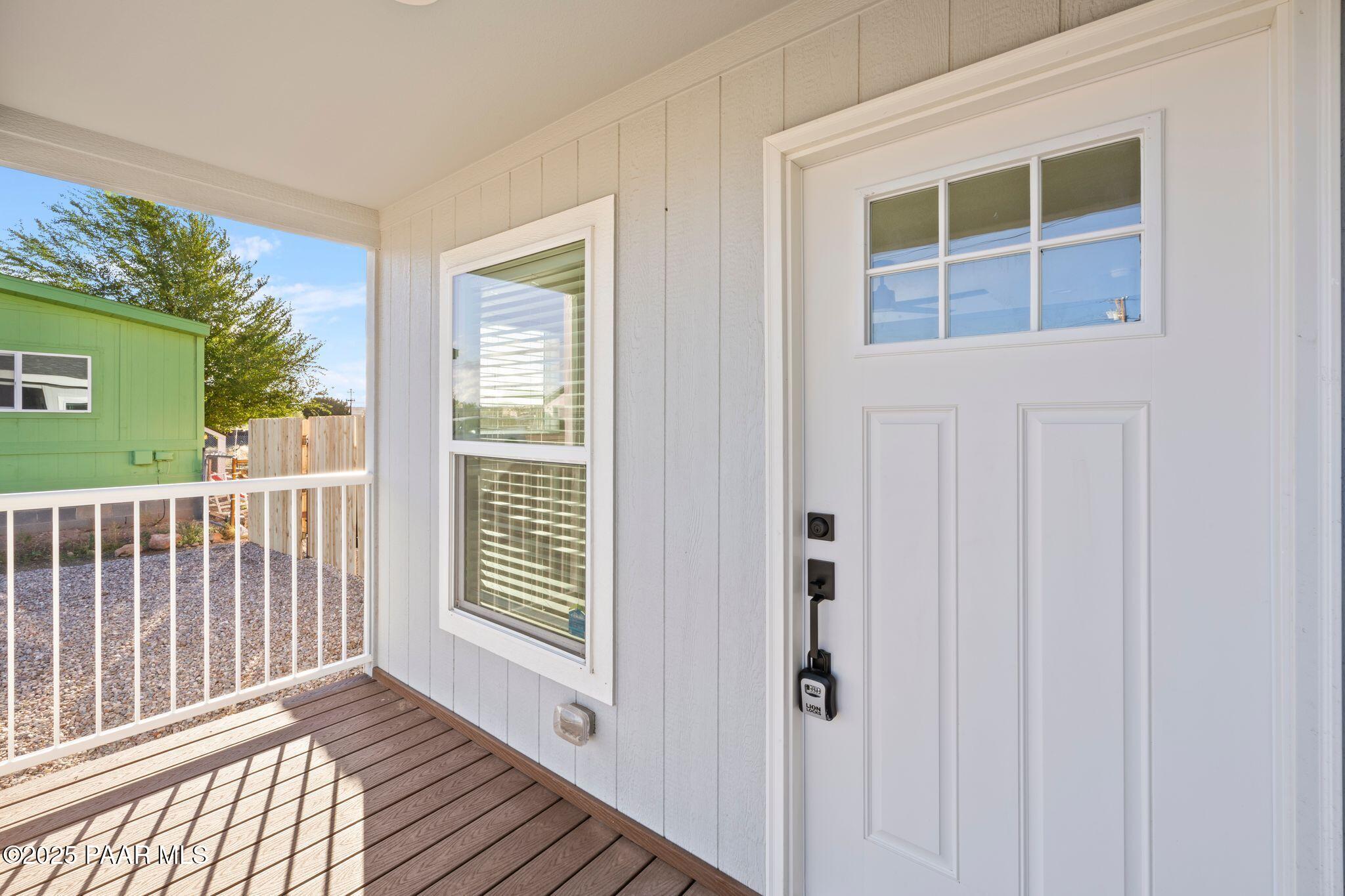 375 West Venice Way Paulden, AZ 86334 - Photo 5 of 41 a view of a porch with wooden floor and a window
