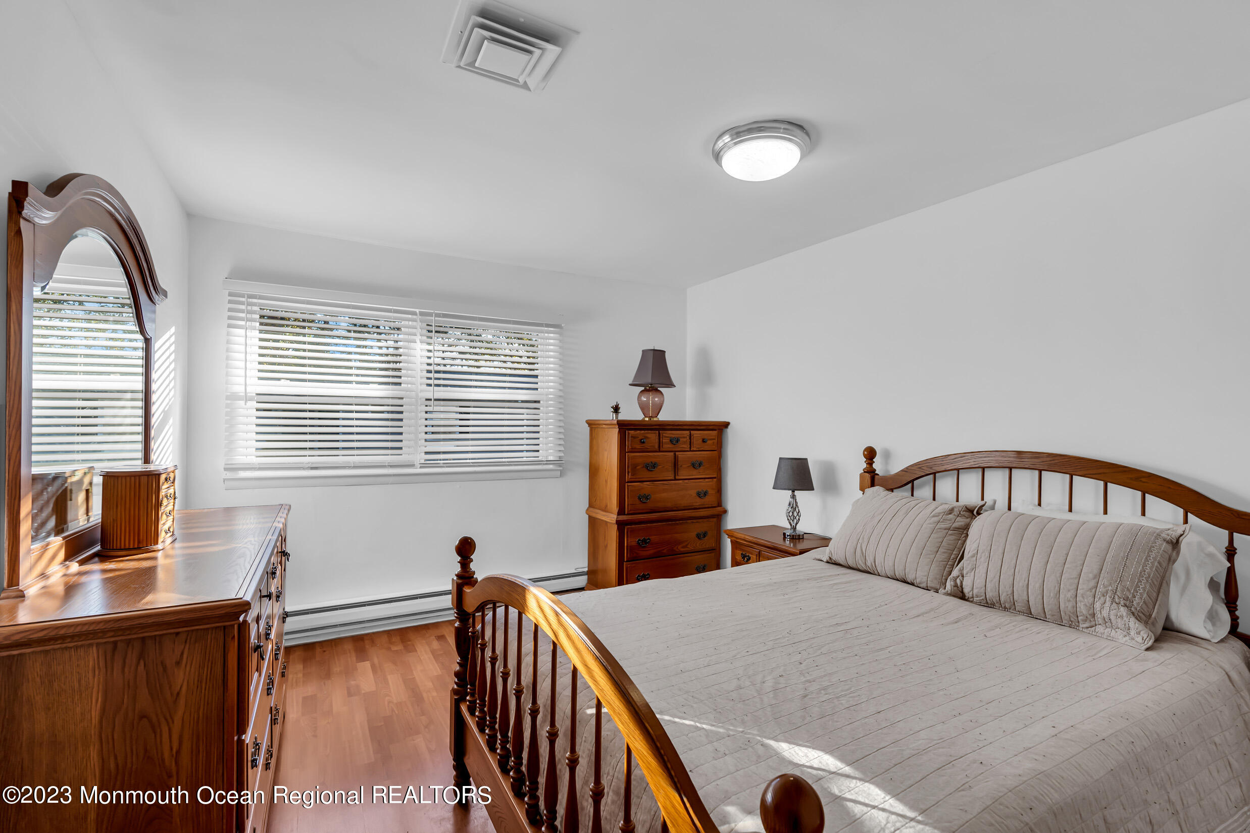 18 Poe Road Brick, NJ 08724 - Photo 21 of 28 a bedroom with furniture and a window