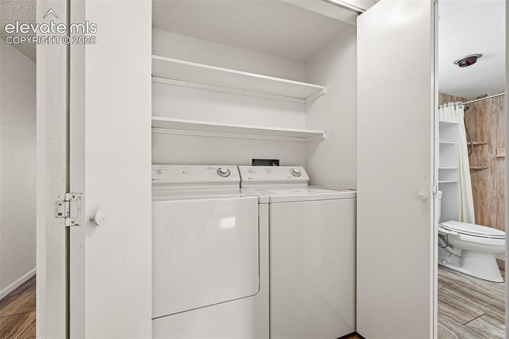 1018 Fontmore Road, Unit A Colorado Springs, CO 80904 - Photo 19 of 28 a utility room with dryer and washer