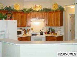 14324 Joseph Clark Road Charlotte, NC 28273 - Photo 6 of 8 a view of a kitchen with a large window