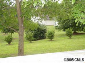 14324 Joseph Clark Road Charlotte, NC 28273 - Photo 8 of 8 a picture of a yard
