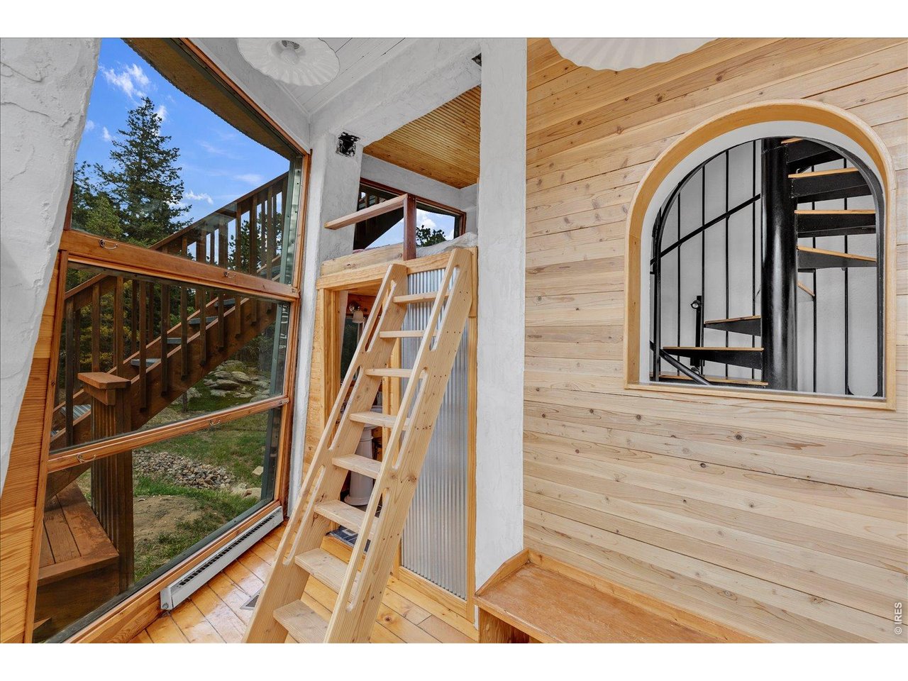 404 Porter Ranch Road Nederland, CO 80466 - Photo 13 of 36 main level with ladder to sleeping loft
