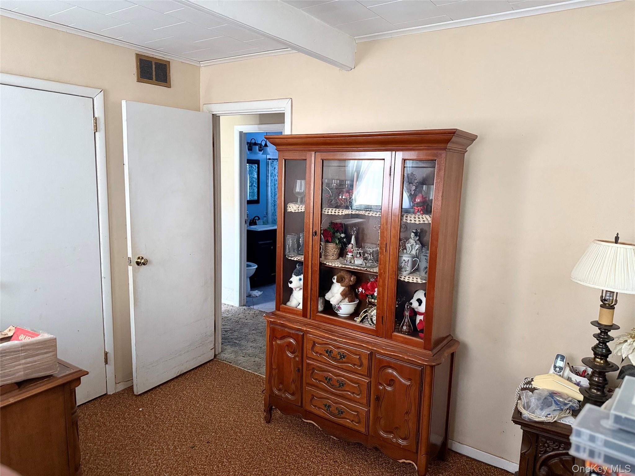 1663 North Thompson Drive Bay Shore, NY 11706 - Photo 11 of 22 a bed room with furniture and a window