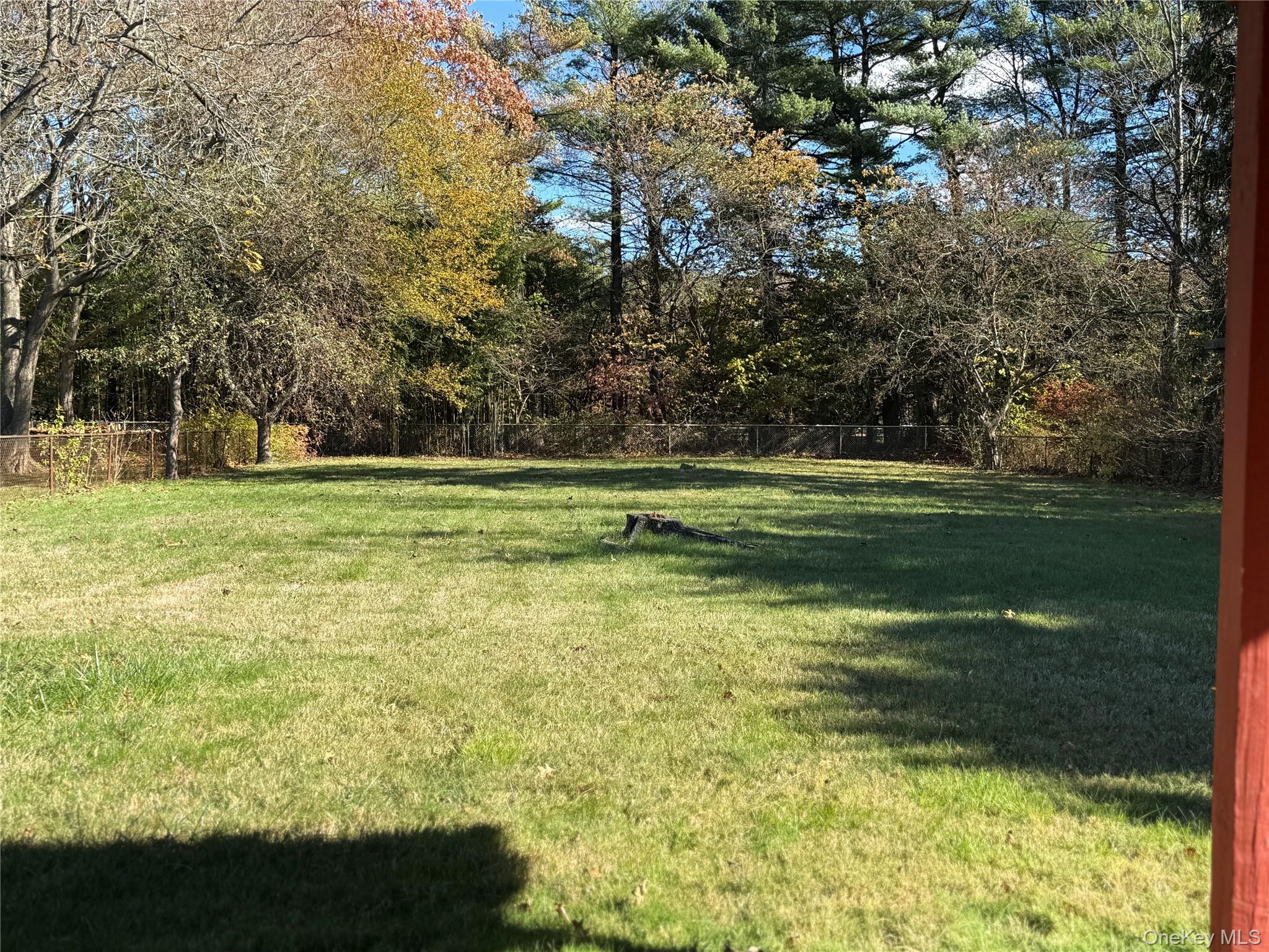 1663 North Thompson Drive Bay Shore, NY 11706 - Photo 16 of 22 a view of a golf course with a lake