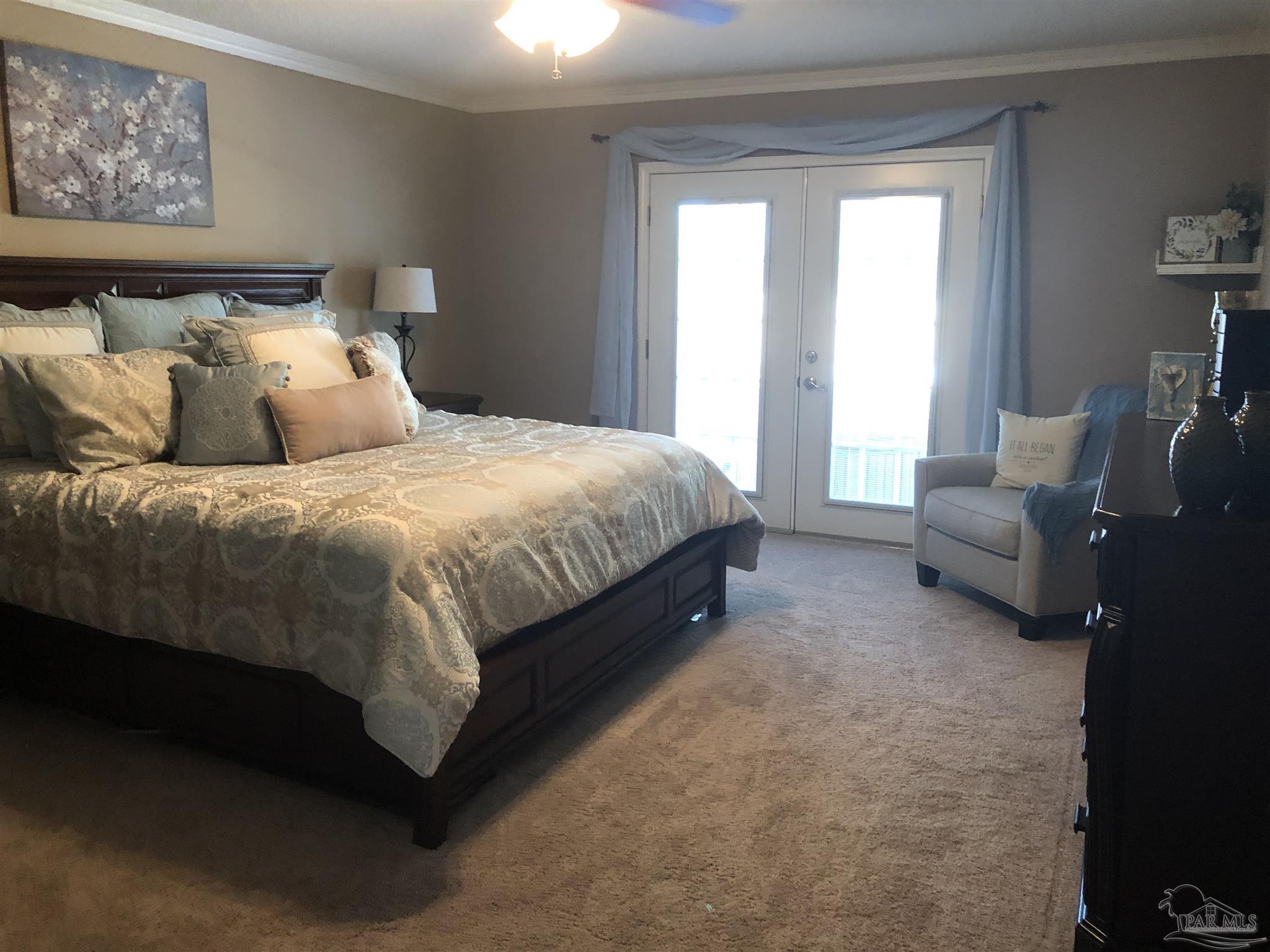 1258 Tate Road Cantonment, FL 32533 - Photo 11 of 35 Over sized master with french doors to the pool