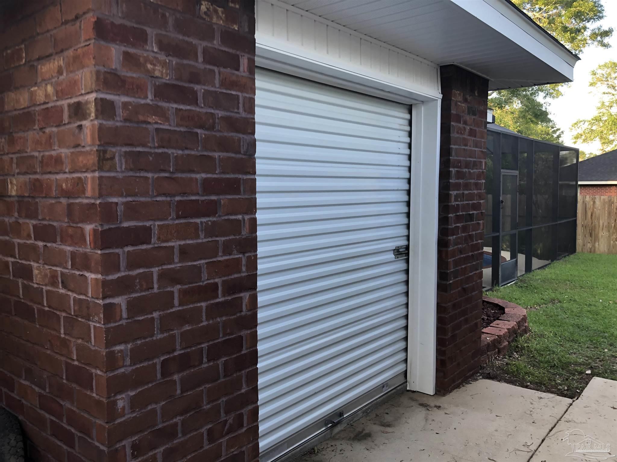 1258 Tate Road Cantonment, FL 32533 - Photo 26 of 35 Exterior of extra tool storage