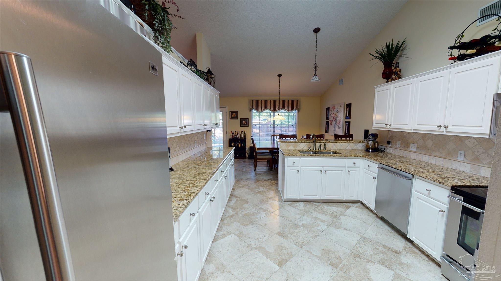 1258 Tate Road Cantonment, FL 32533 - Photo 8 of 35 Remolded kitchen, Granite, Tile & Stainless