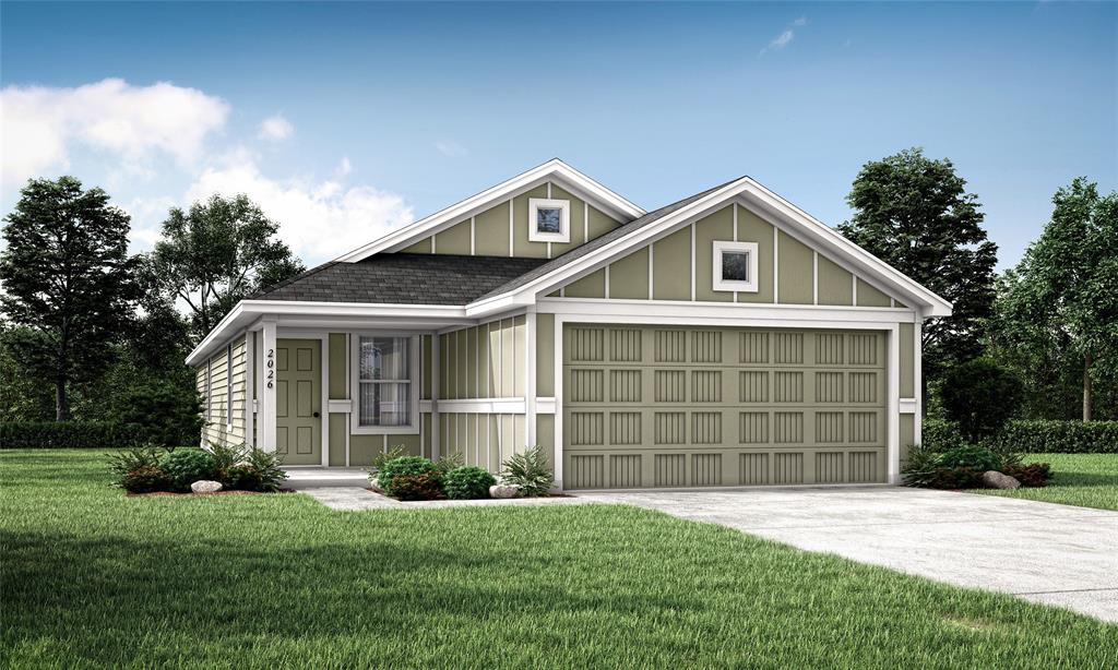 a front view of a house with a garage