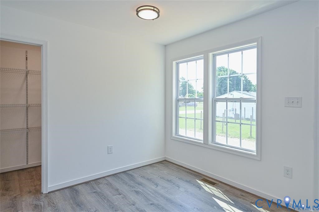 606 West Point Drive Ruther Glen, VA 22546 - Photo 13 of 30 a view of an empty room with a window