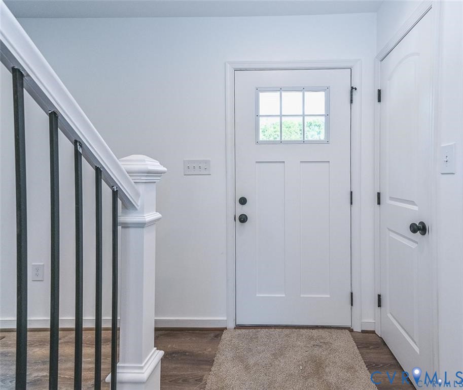 606 West Point Drive Ruther Glen, VA 22546 - Photo 2 of 30 a view of an entryway with wooden floor