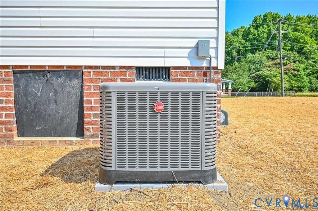 606 West Point Drive Ruther Glen, VA 22546 - Photo 27 of 30 a view of a brick house with a yard