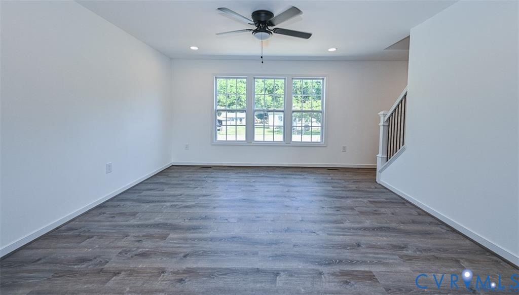 606 West Point Drive Ruther Glen, VA 22546 - Photo 4 of 30 wooden floor in an empty room with a window