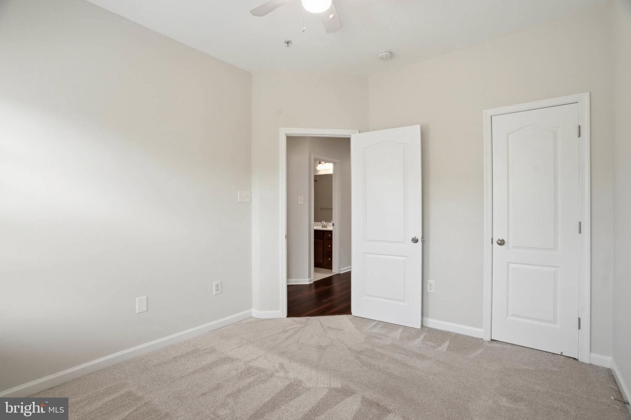 9817 Solar Course Laurel, MD 20723 - Photo 22 of 59 a view of an empty room with a bathroom