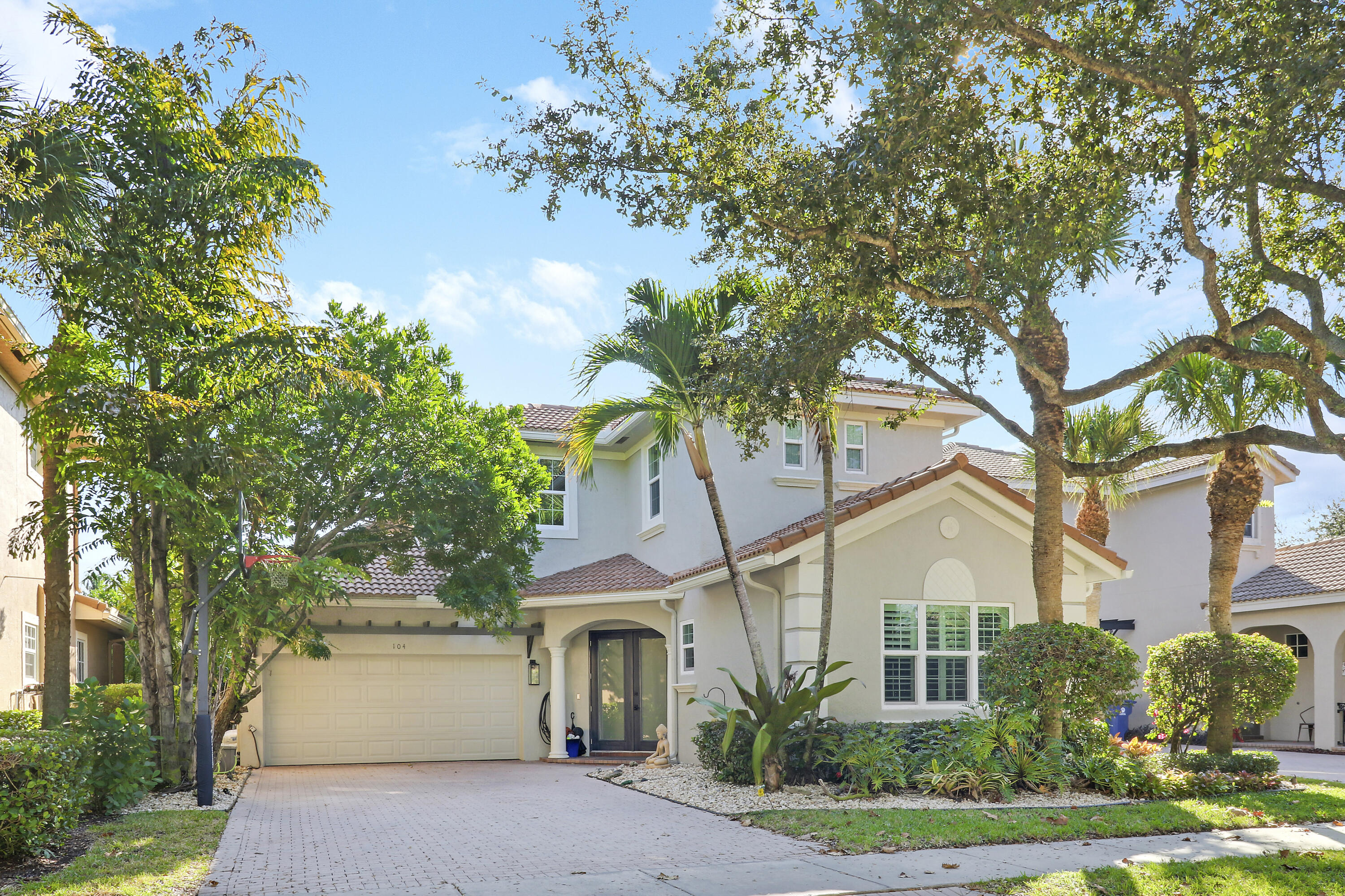 104 Via Azurra Jupiter, FL 33458 - Photo 1 of 41 House Front