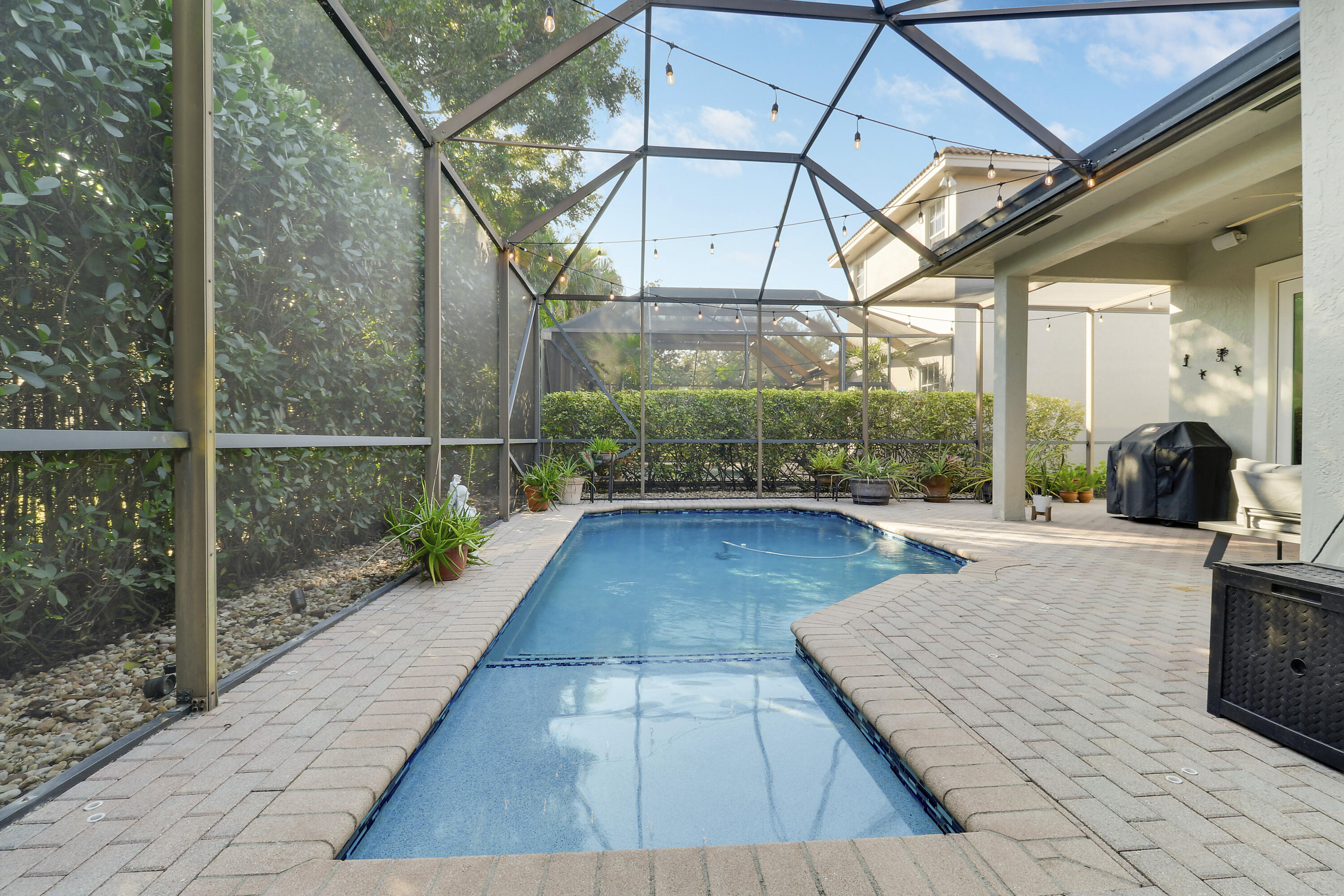 104 Via Azurra Jupiter, FL 33458 - Photo 21 of 41 a view of a swimming pool