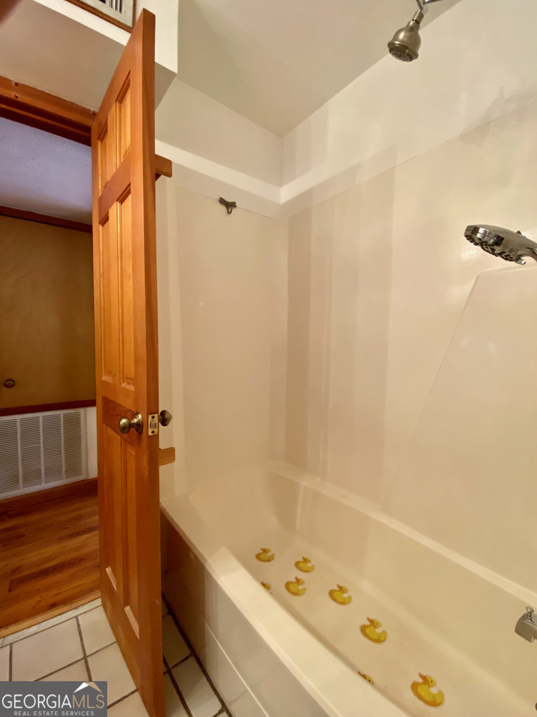 231 West Seminole Drive Byron, GA 31008 - Photo 11 of 38 a bathroom with a tub a sink and a shower