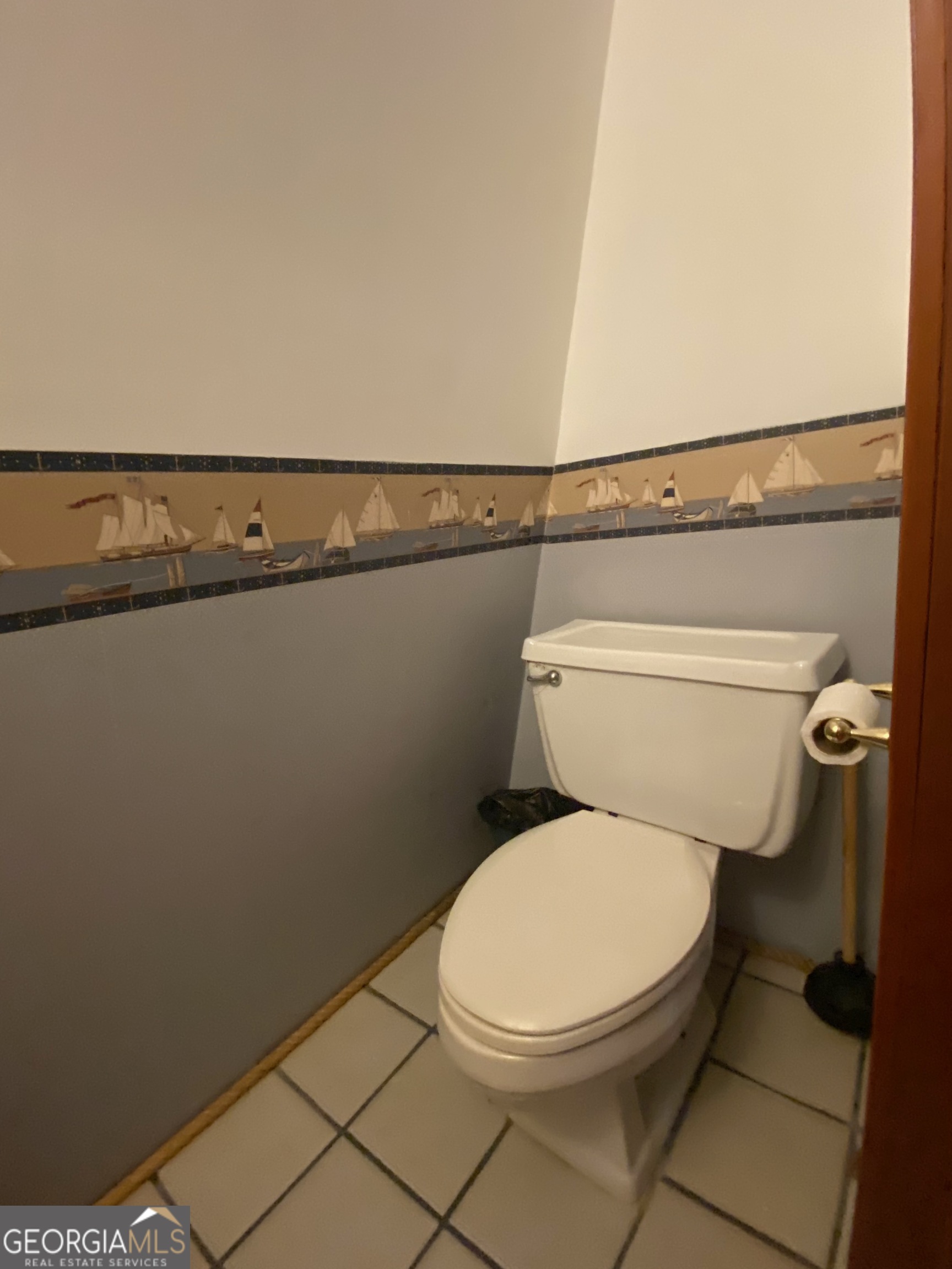 231 West Seminole Drive Byron, GA 31008 - Photo 16 of 38 a close view of a toilet and a sink