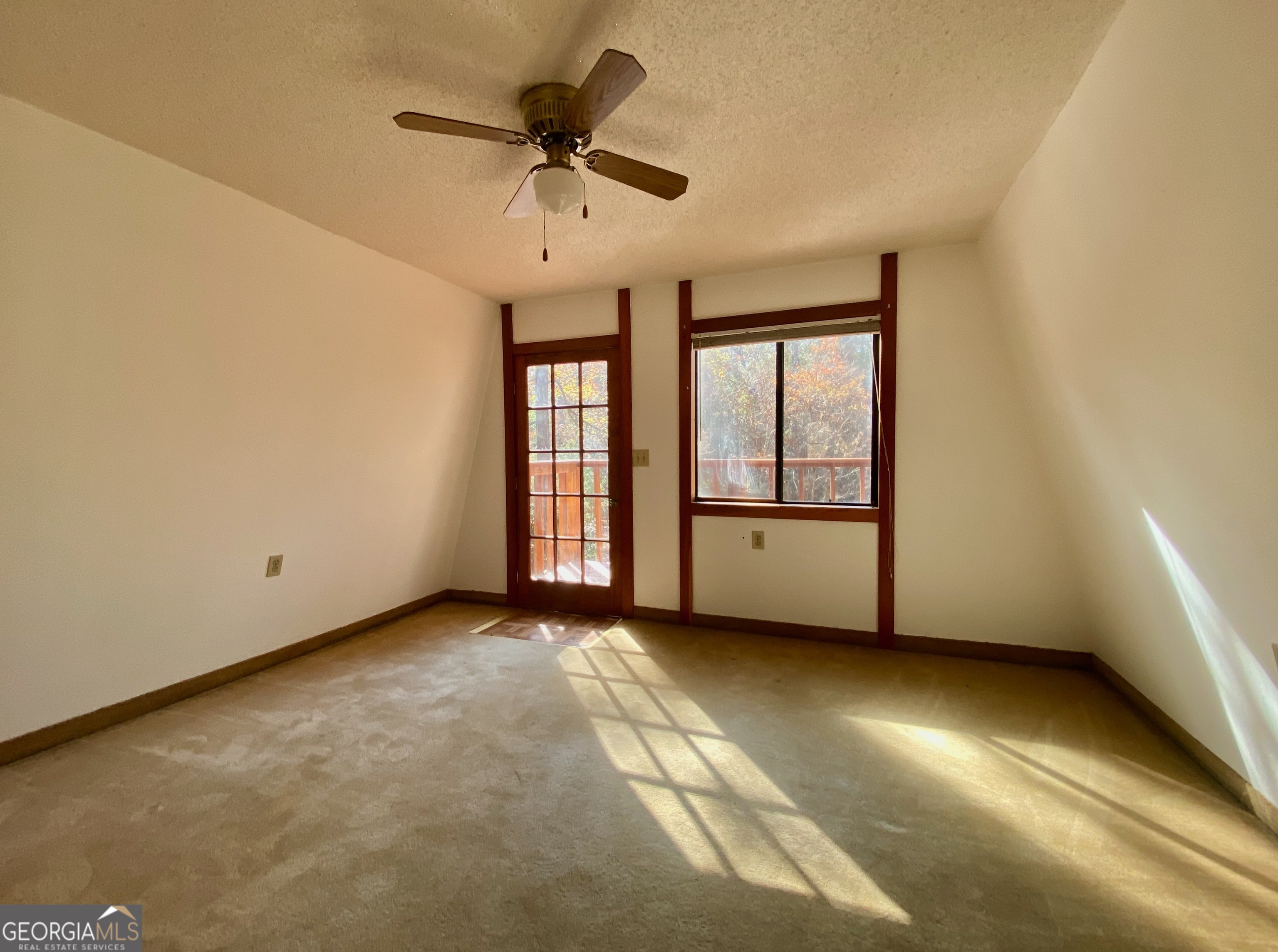 231 West Seminole Drive Byron, GA 31008 - Photo 17 of 38 a view of an empty room with a window