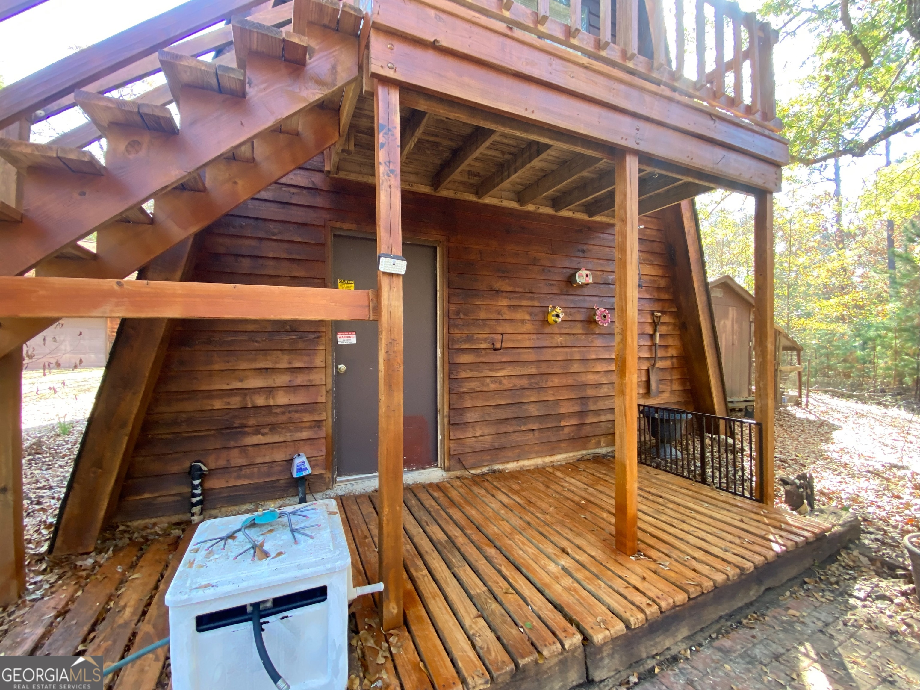 231 West Seminole Drive Byron, GA 31008 - Photo 21 of 38 a view of deck with wooden floor and outdoor seating