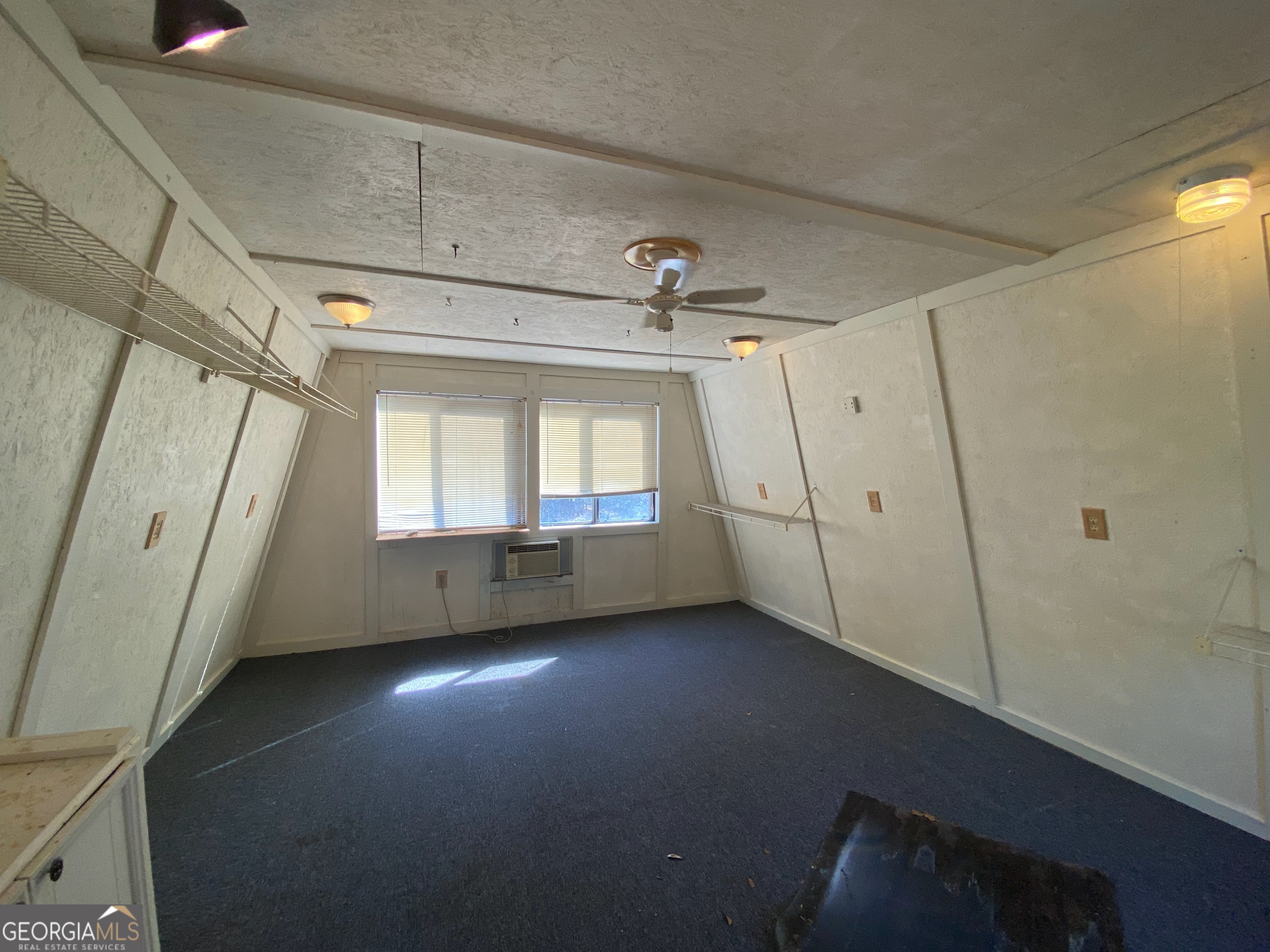231 West Seminole Drive Byron, GA 31008 - Photo 24 of 38 a view of an empty room with a window