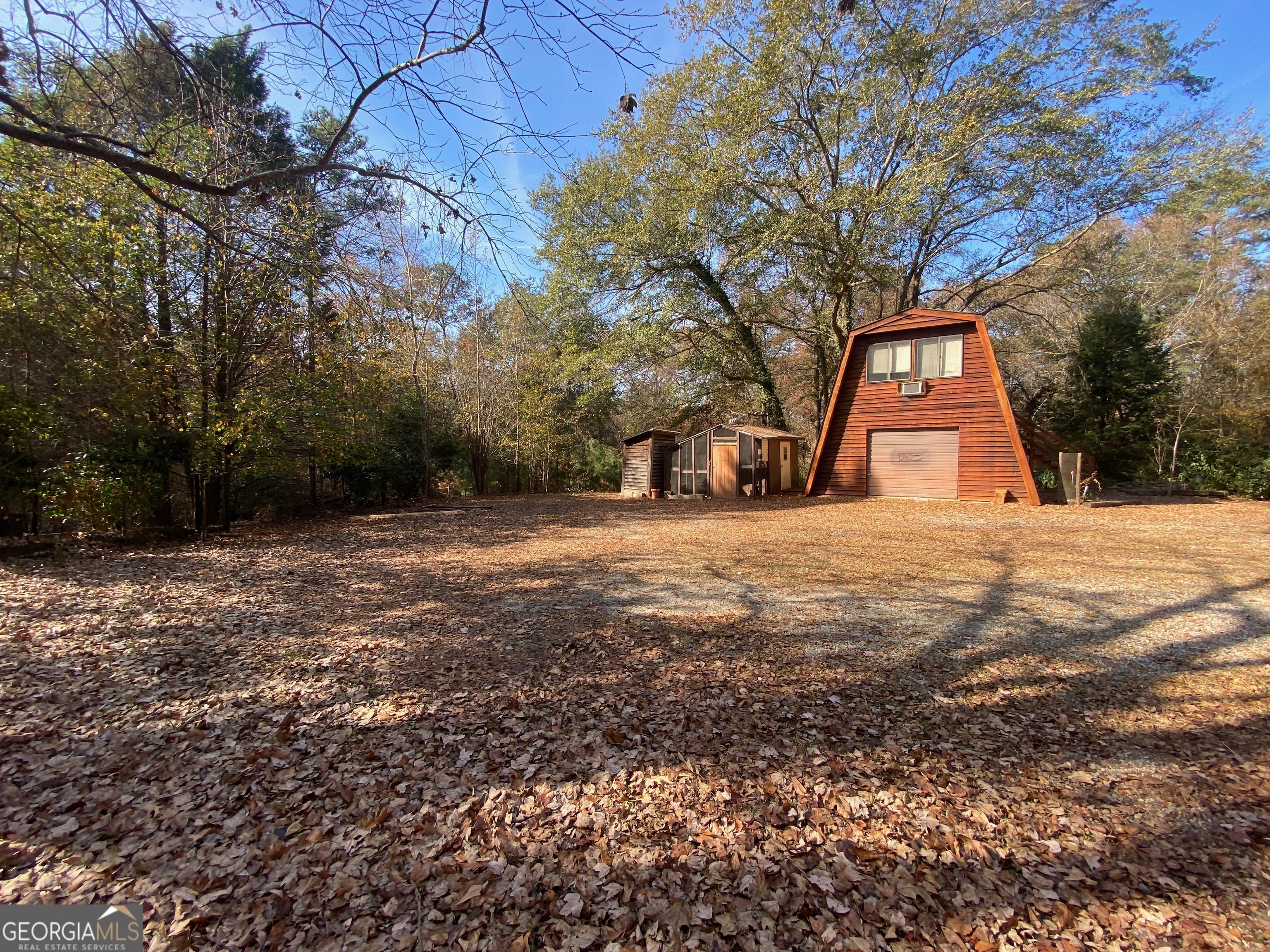 231 West Seminole Drive Byron, GA 31008 - Photo 26 of 38 a view of a yard with trees