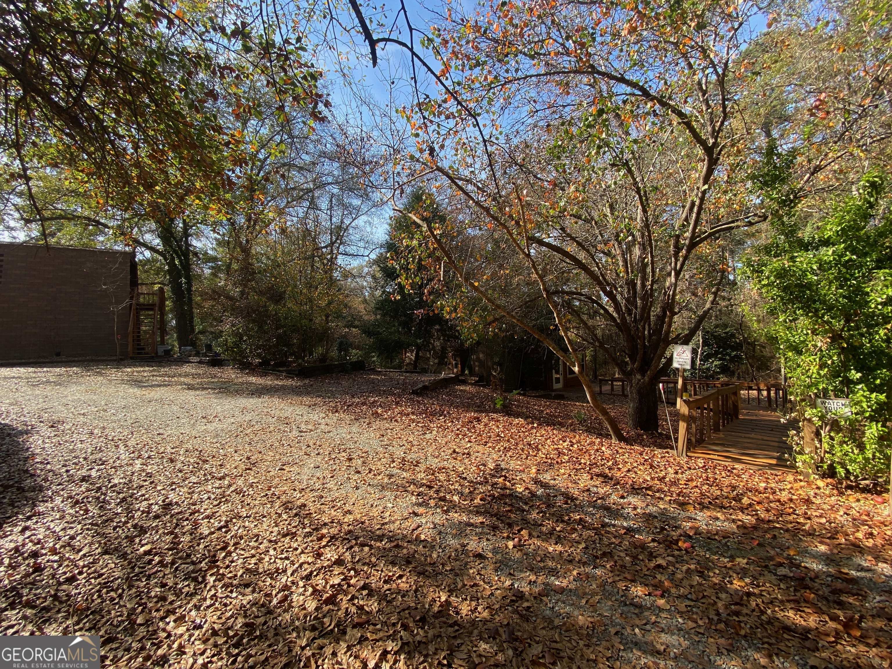 231 West Seminole Drive Byron, GA 31008 - Photo 37 of 38 a backyard of a house with large trees
