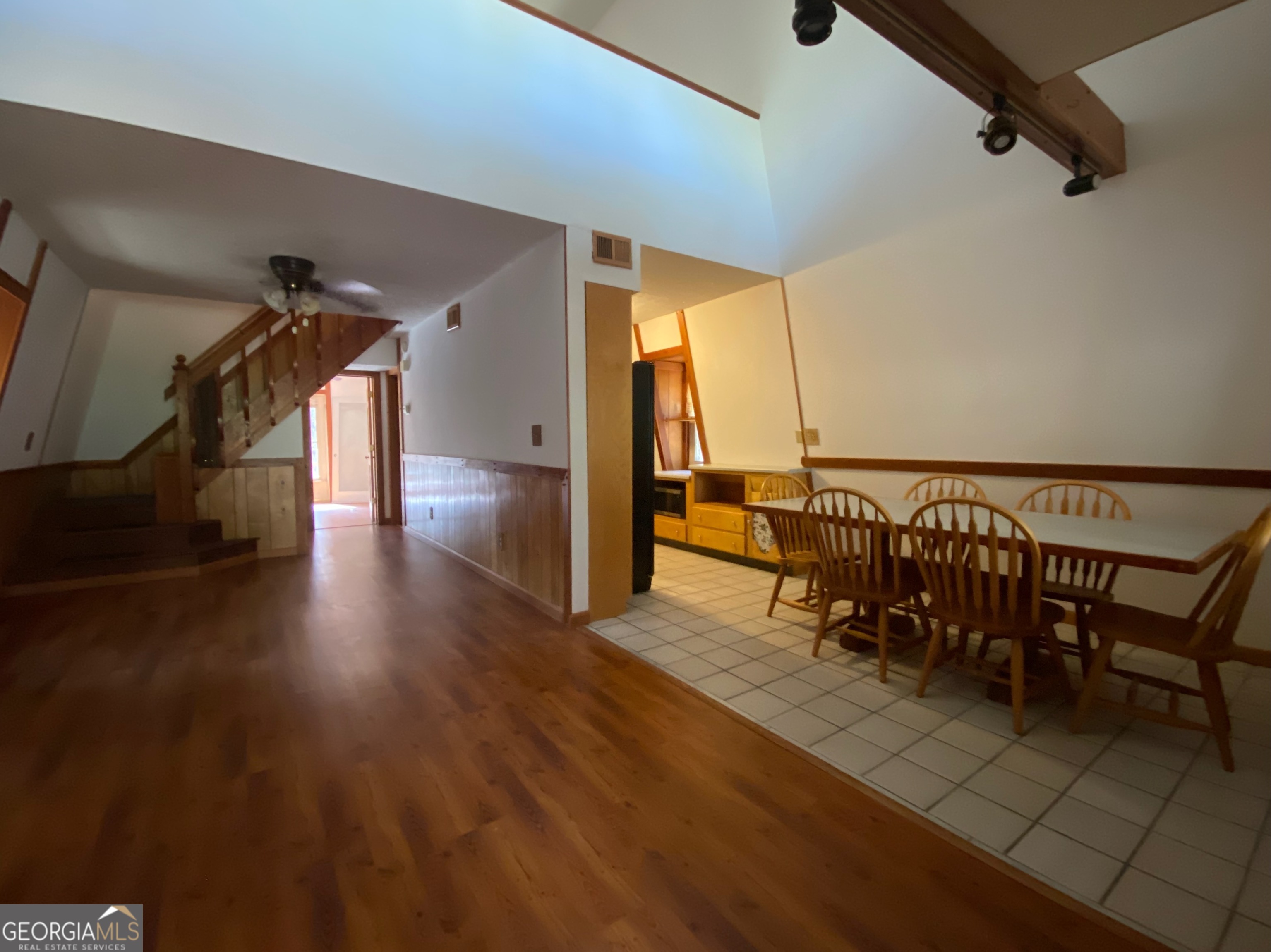 231 West Seminole Drive Byron, GA 31008 - Photo 4 of 38 a view of dining room with furniture and wooden floor