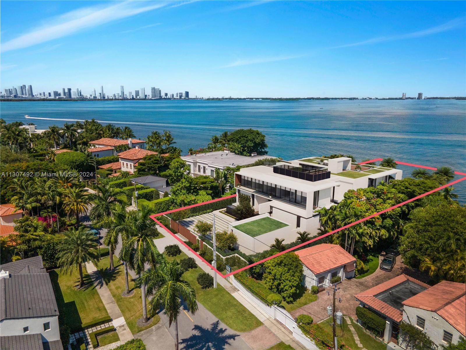 4736 North Bay Road Miami Beach, FL 33140 - Photo 1 of 1 an aerial view of a house with outdoor space lake view and ocean view