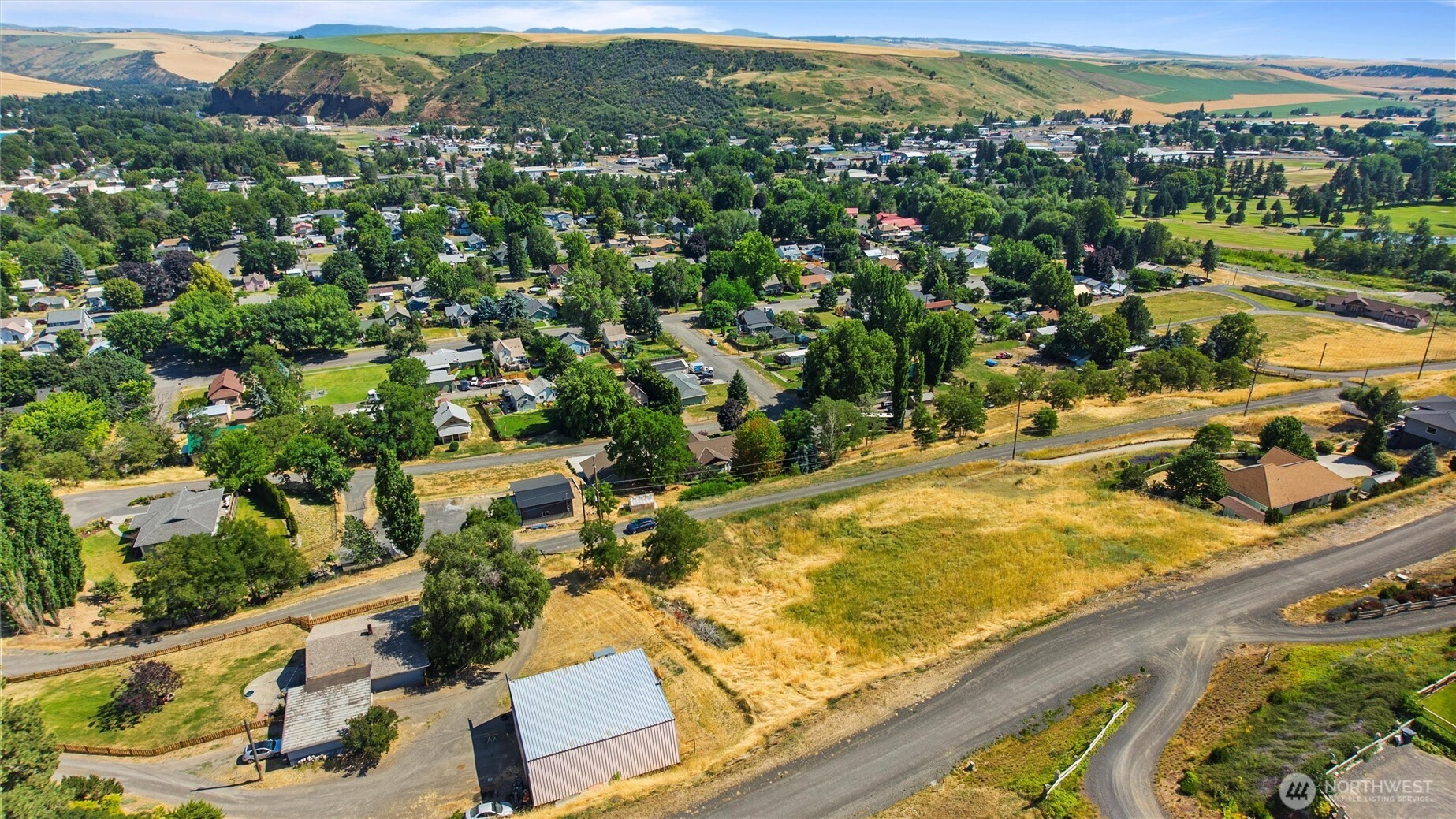 0 West Whitman Avenue Dayton, WA 99328 - Photo 3 of 7 an aerial view of residential houses with outdoor space