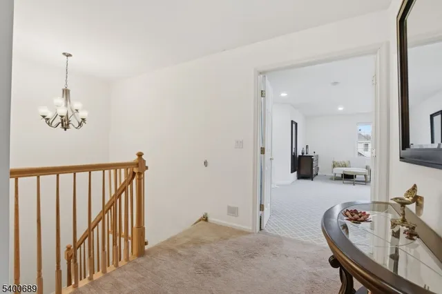a view of a livingroom with furniture and windows