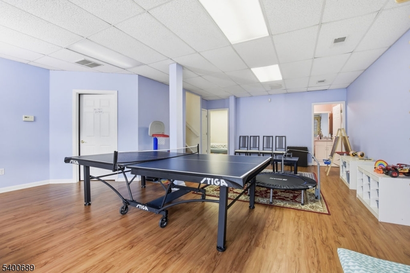 29 Pine Valley Road Livingston, NJ 07039 - Photo 22 of 30 a view of a dining room with furniture and wooden floor