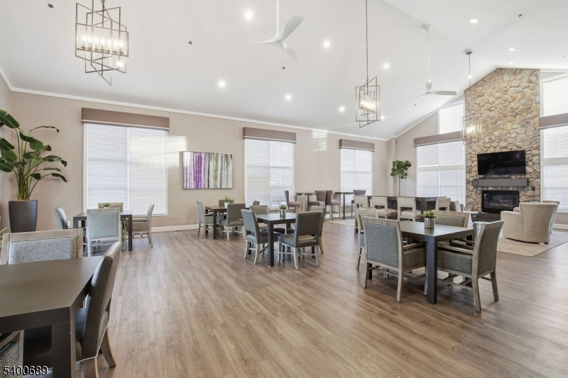 29 Pine Valley Road Livingston, NJ 07039 - Photo 29 of 30 a view of a dining room with furniture window and wooden floor