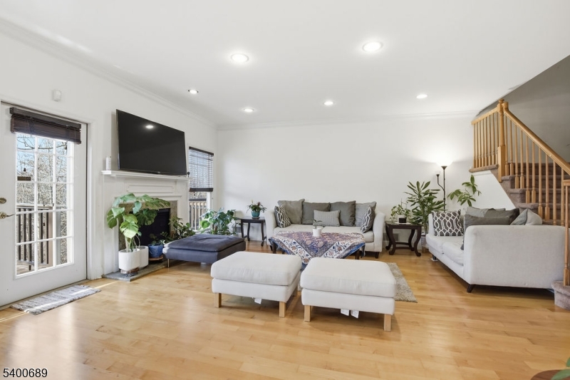 29 Pine Valley Road Livingston, NJ 07039 - Photo 4 of 30 a living room with furniture and a flat screen tv
