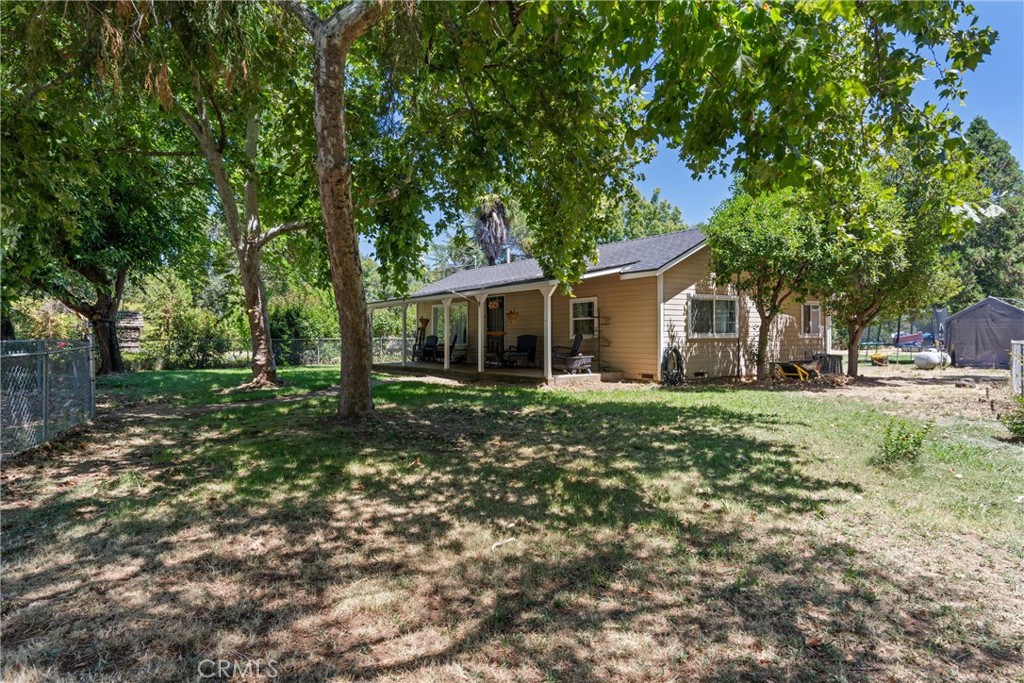 5150 Miners Ranch Road Oroville, CA 95966 - Photo 21 of 36 a view of a house with yard and a tree