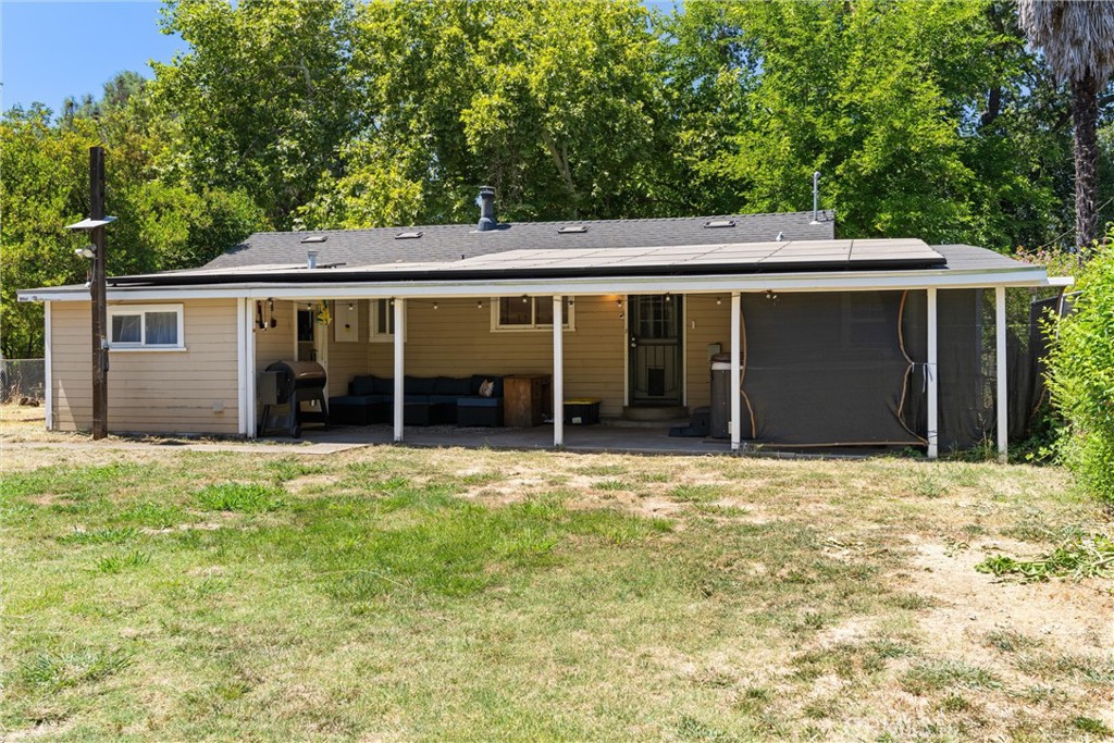 5150 Miners Ranch Road Oroville, CA 95966 - Photo 28 of 36 front view of a house with a yard and garage