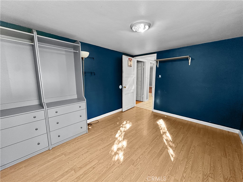 5150 Miners Ranch Road Oroville, CA 95966 - Photo 8 of 12 a view of an empty room with wooden floor