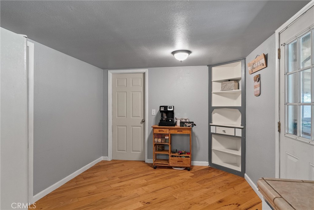 5150 Miners Ranch Road Oroville, CA 95966 - Photo 10 of 36 a bedroom with a bed and a window