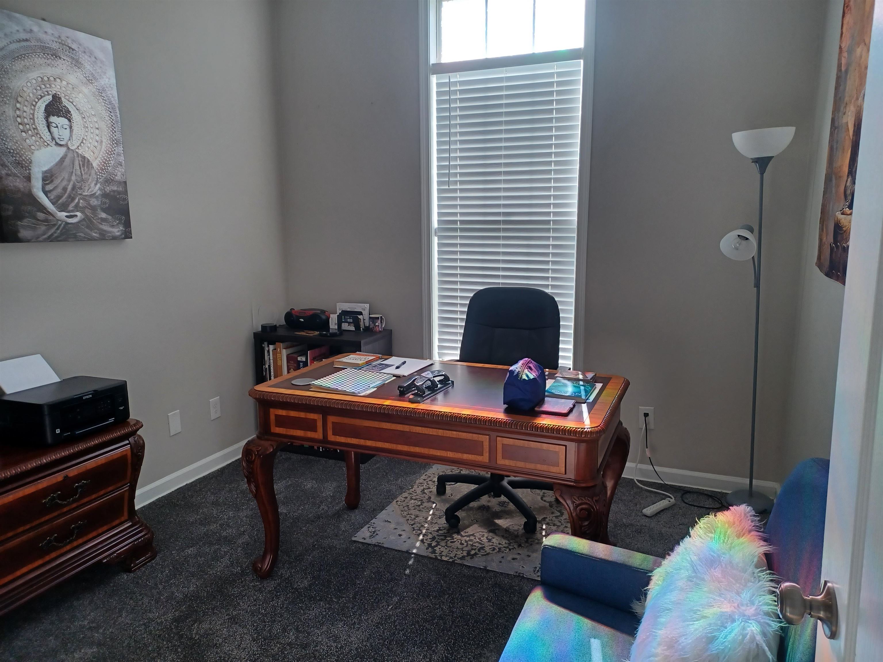 8700 Macon Road Memphis, TN 38018 - Photo 13 of 18 a view of a workspace with furniture and a window