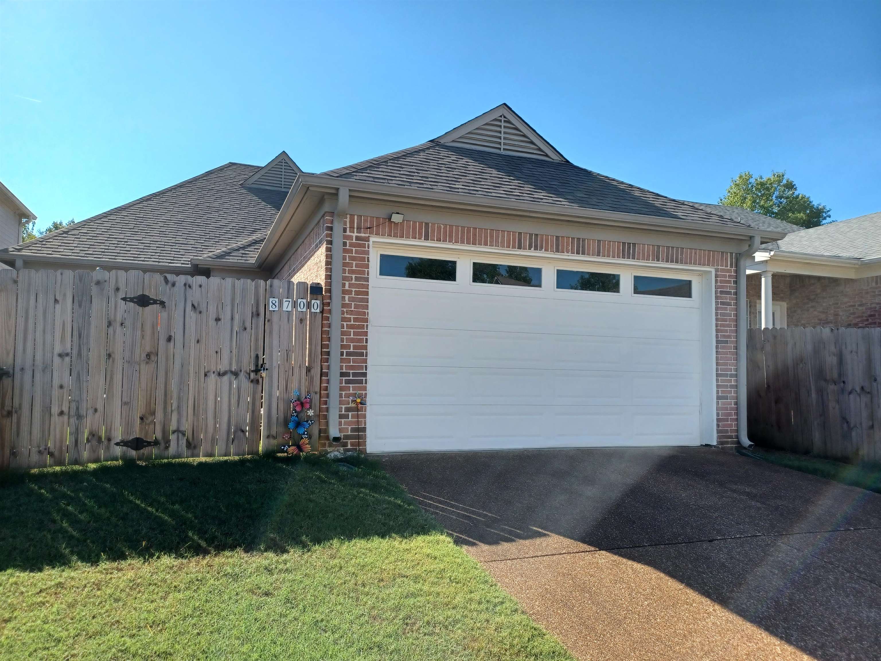 8700 Macon Road Memphis, TN 38018 - Photo 18 of 18 a front view of a house with garden