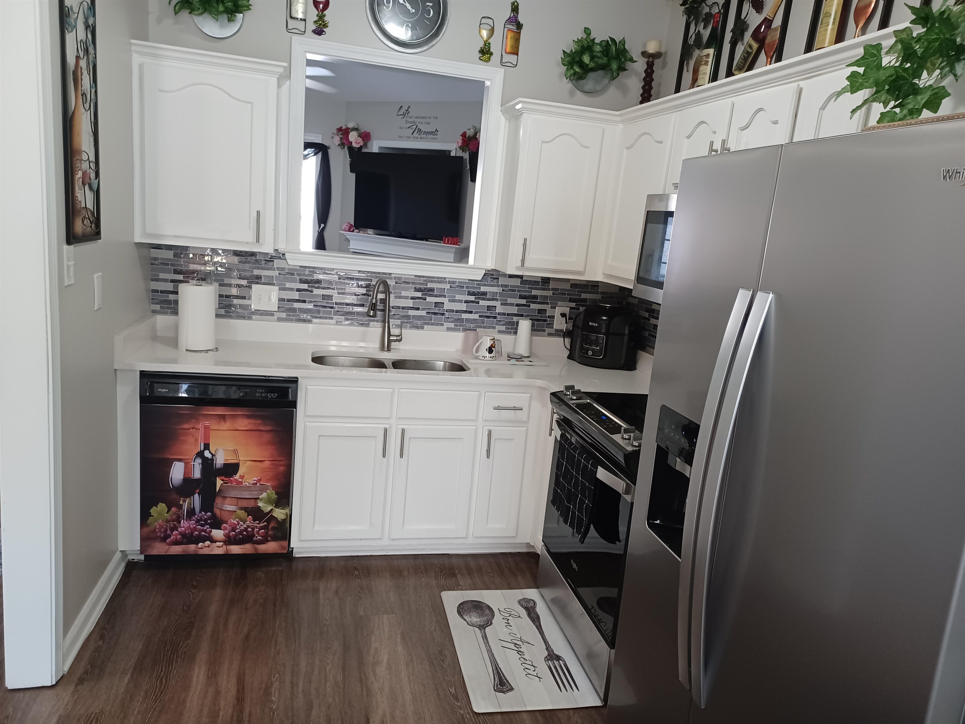 8700 Macon Road Memphis, TN 38018 - Photo 4 of 18 a view of cabinets a washer and dryer