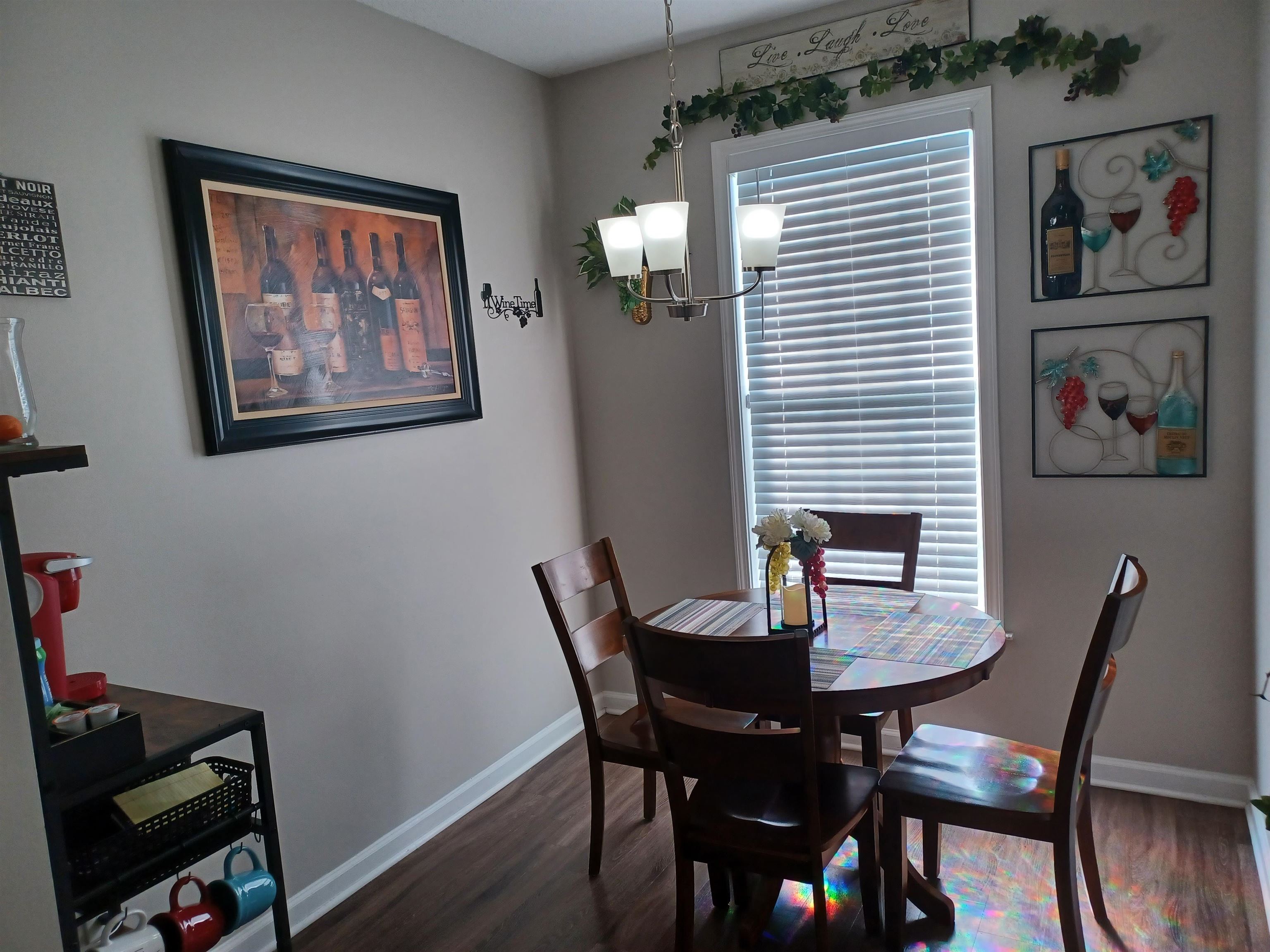 8700 Macon Road Memphis, TN 38018 - Photo 7 of 18 a view of a dining room with furniture and wooden floor