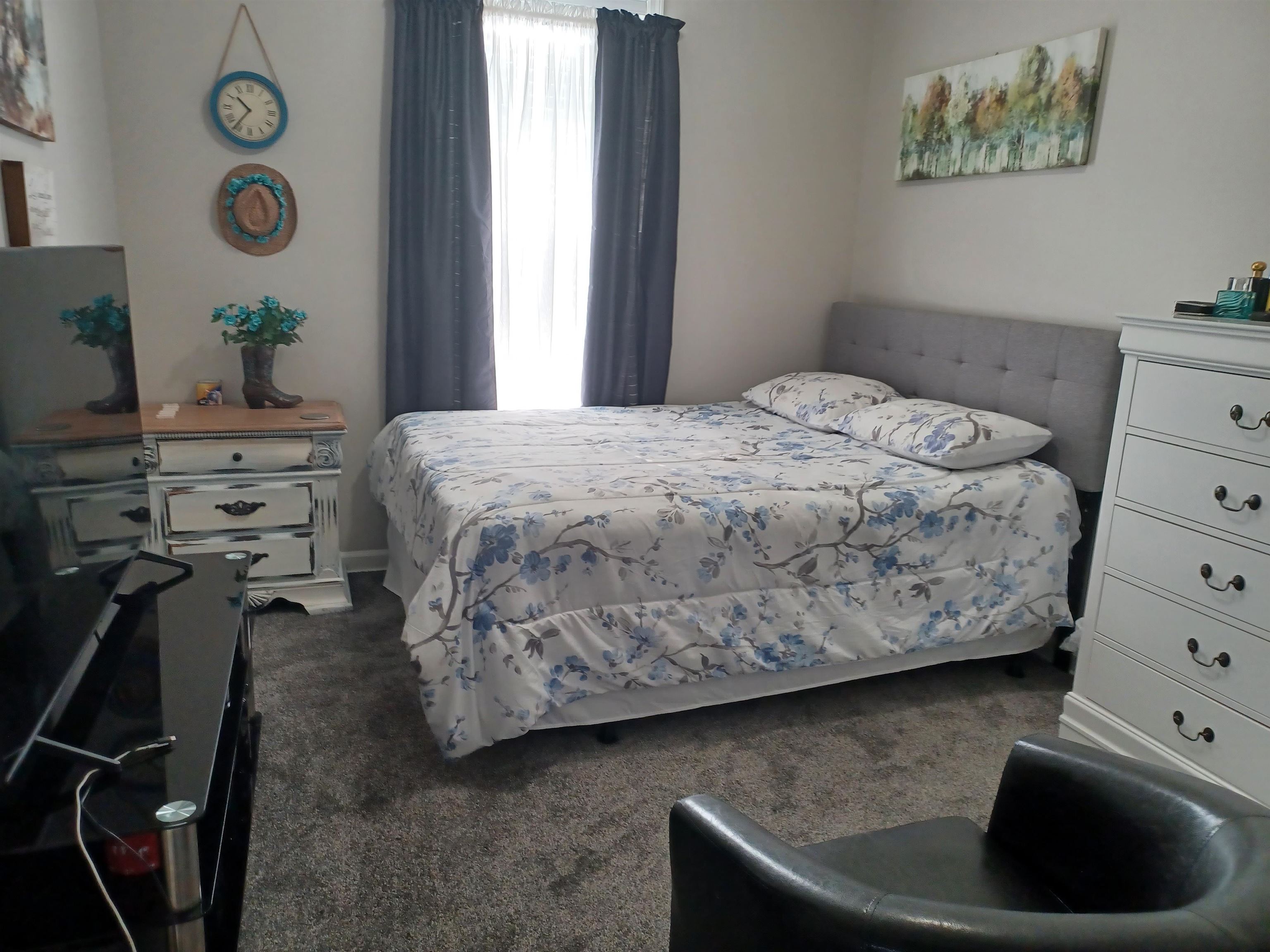 8700 Macon Road Memphis, TN 38018 - Photo 10 of 18 a bedroom with a bed and cabinets