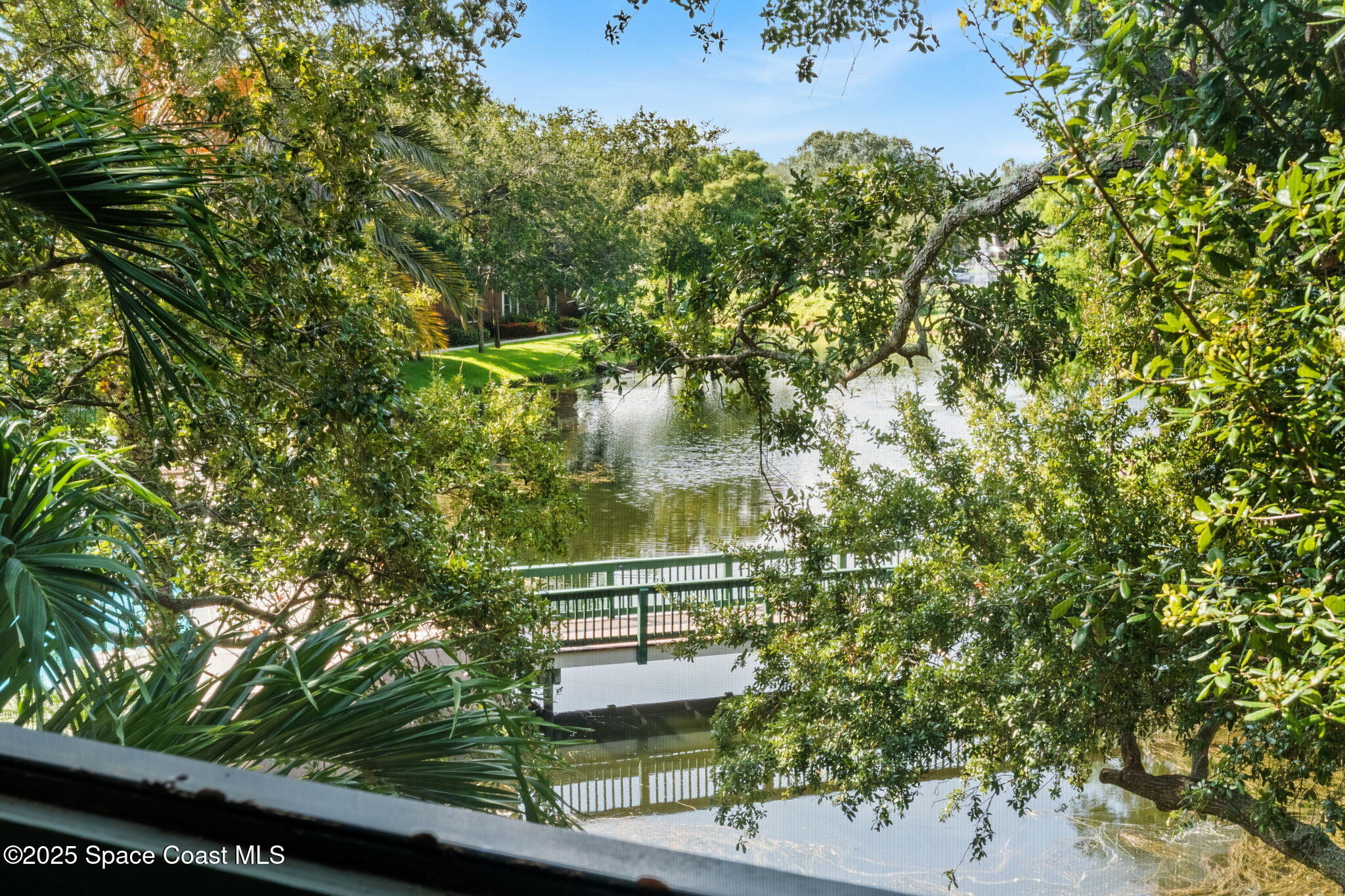 7667 North Wickham Road, Unit 518 Melbourne, FL 32940 - Photo 2 of 34 a view of a yard
