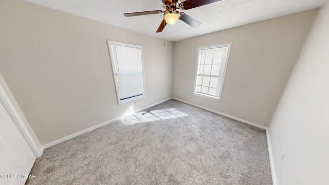 a view of table and chairs in the floor