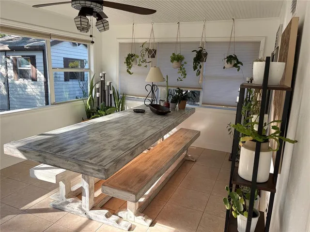 a room with gym equipment and a table