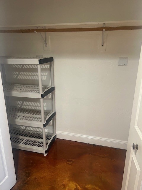 17 Federal Street, Unit 210 Worcester, MA 01608 - Photo 5 of 8 a view of walk in closet with empty racks