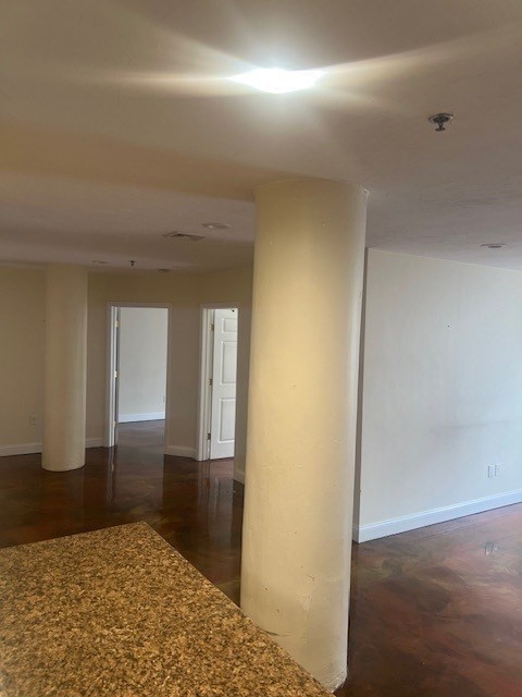 17 Federal Street, Unit 210 Worcester, MA 01608 - Photo 6 of 8 a view of hallway with a rug and a bathroom