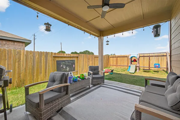 a front view of a house with backyard