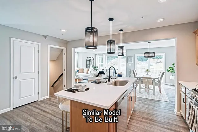 a very nice looking dining room with a table and chairs