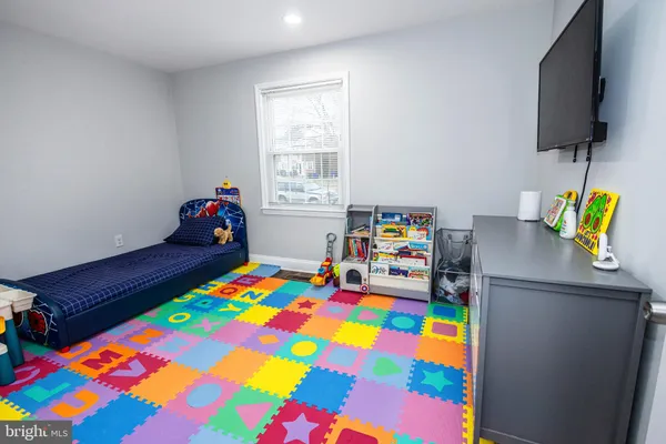 a kids room with toys and toys